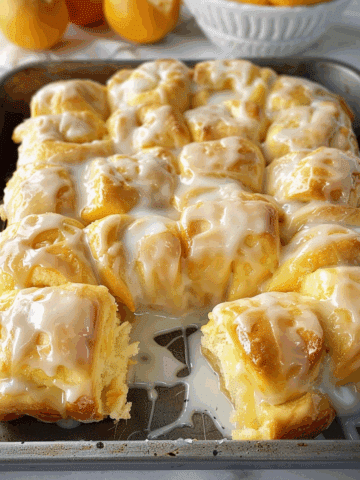 Orange Rolls with a Warm Sour Cream Butter Glaze