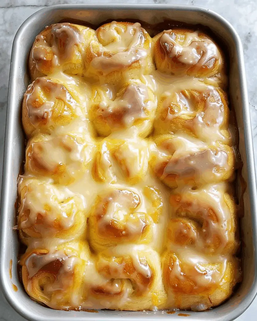 Orange Rolls with a Warm Sour Cream Butter Glaze