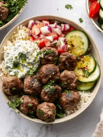 Gyro Bowls (Meatballs with Tzatziki, Lemon Rice, and Cucumber Salad)
