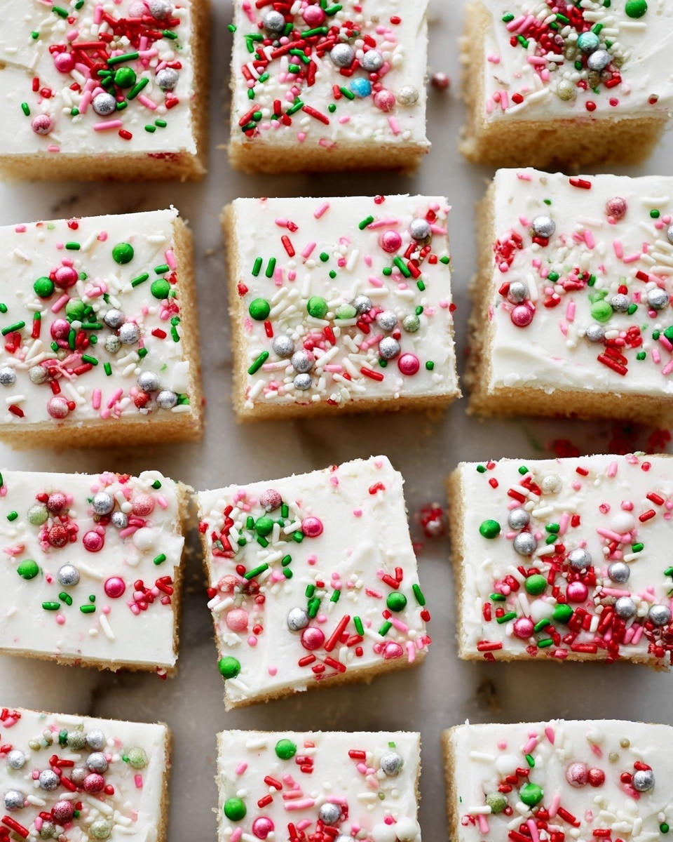 The image shows a grid of square-shaped cakes cut into 20 equal pieces, each with two main layers. The bottom layer is light brown with a soft, cake-like texture, and the top layer is a thick, smooth white frosting. The frosting is decorated with a mix of colorful round and stick-shaped sprinkles in red, green, pink, white, silver, and light blue, scattered unevenly but richly on the surface. The cakes are placed closely together on a flat, white marbled surface, and the photo is taken from above with an iPhone --ar 4:5 --v 7