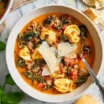 Slow Cooker Tortellini Soup with Sausage, Tomatoes, and Greens Recipe
