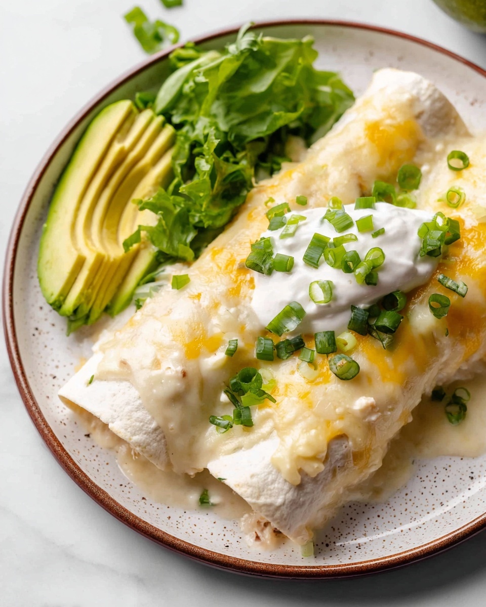 A white baking dish filled with 8 rolled tortillas placed side by side in two rows, covered in a thick creamy white sauce with melted yellow and white cheese on top. The dish is sprinkled evenly with chopped green onions and fresh cilantro leaves. Surrounding the dish are three small white bowls containing more chopped green onions, lettuce, and cilantro. A white plate is partially visible on the left, with a striped cloth napkin and a fork and knife set placed on a white marbled surface. photo taken with an iphone --ar 4:5 --v 7