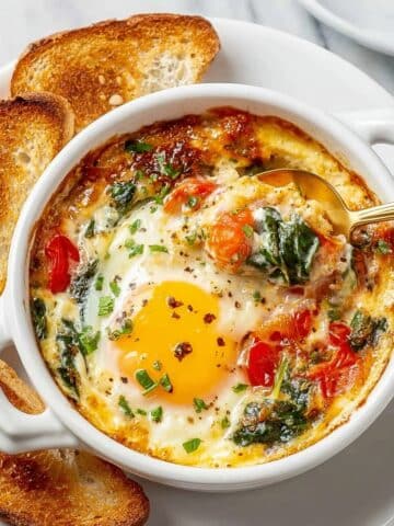 Baked Feta Eggs with Cherry Tomatoes and Veggies Recipe