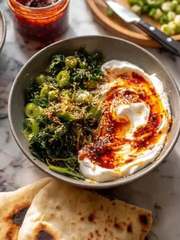 Harissa Eggs in Whipped Goat Cheese with Avocado Salad and Chili Butter Recipe
