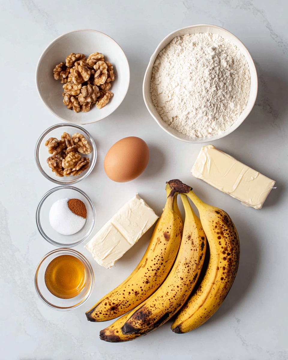 The image shows ingredients placed neatly on a white marbled surface. There are three ripe bananas with dark spots laid side by side at the bottom right. Above them is a small stick of butter wrapped in paper, next to a brown egg. To the left of the egg, there are two white bowls, one filled with flour and the other with walnut halves. Further left are four small glass bowls arranged in a square shape, containing cinnamon, salt, baking soda, and baking powder from top left clockwise. Below these bowls, there is a small glass cup filled with honey. The scene is bright and clean with soft natural lighting. photo taken with an iphone --ar 4:5 --v 7
