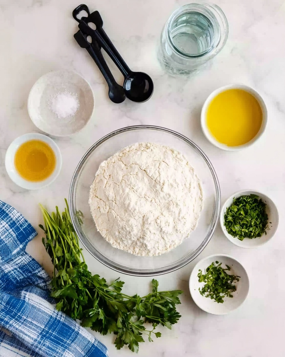 A clear glass bowl filled with a heap of white flour sits in the center on a white marbled surface. Around it are smaller white bowls holding various ingredients: a small bowl of salt, a bowl of golden olive oil, a bowl with a beaten yellow mixture with green herbs, and another with chopped green herbs. There is a glass jar filled with water and a set of black measuring spoons resting nearby. A bunch of fresh green parsley lies below the bowls, and a blue and white checkered cloth is partly visible on the lower left corner. photo taken with an iphone --ar 4:5 --v 7
