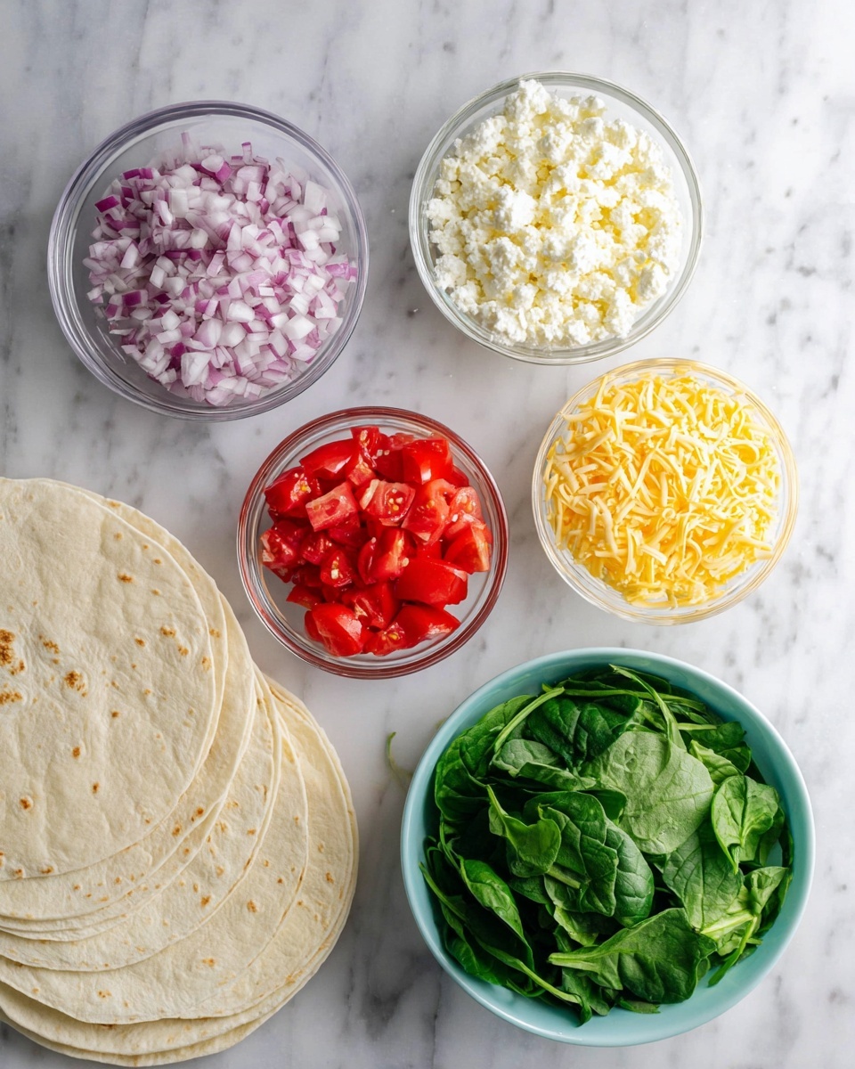 The image shows a white marbled surface with several bowls and tortillas arranged neatly. Starting from the top left, there is a clear bowl filled with finely chopped red onions, next to it on the right is another clear bowl with white crumbly cheese. Below the onions is a white bowl containing small red tomato pieces, and to its right, a white bowl full of shredded yellow cheese. At the bottom, there is a light blue bowl filled with fresh green spinach leaves. On the left side of the image, there are several white tortillas stacked, partially visible. Photo taken with an iphone --ar 4:5 --v 7