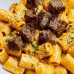 Cajun Steak Tips in Cheesy Rigatoni Parmesan Sauce Recipe