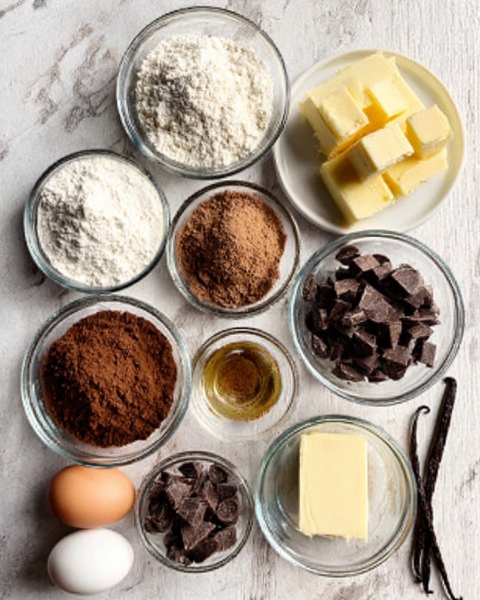 The image shows several small clear glass bowls arranged on a white marbled surface. There are seven bowls containing different ingredients: white flour, light brown sugar, white coconut oil, dark brown cocoa powder, dark chocolate chips, a small amount of salt in a very small clear glass, and yellow butter sticks on a white plate. Additionally, there are two white eggs and a small glass container with a light brown liquid, likely vanilla or syrup. A vanilla bean pod is also visible near the butter. The lighting is natural and bright, highlighting the textures and colors of the ingredients. Photo taken with an iphone --ar 4:5 --v 7