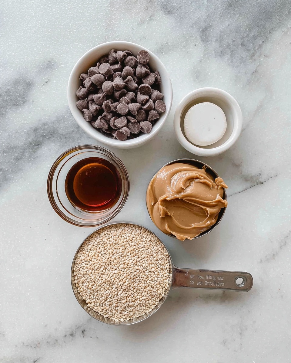 The image shows five small white bowls and measuring cups placed on a white marbled surface. The top left bowl is filled with dark brown chocolate chips that have a smooth texture and small rounded shapes. To its right, a small white bowl holds a round, white powdery tablet. Below these, a small glass bowl contains a dark amber liquid that looks clear. In front of the chocolate chips, a ⅓ cup of light tan sesame seeds fills a metal measuring cup with a flat texture and small grain shapes. Next to it, a ⅓ cup of smooth, light brown peanut butter sits in another metal measuring cup, showing a thick and creamy texture. photo taken with an iphone --ar 4:5 --v 7