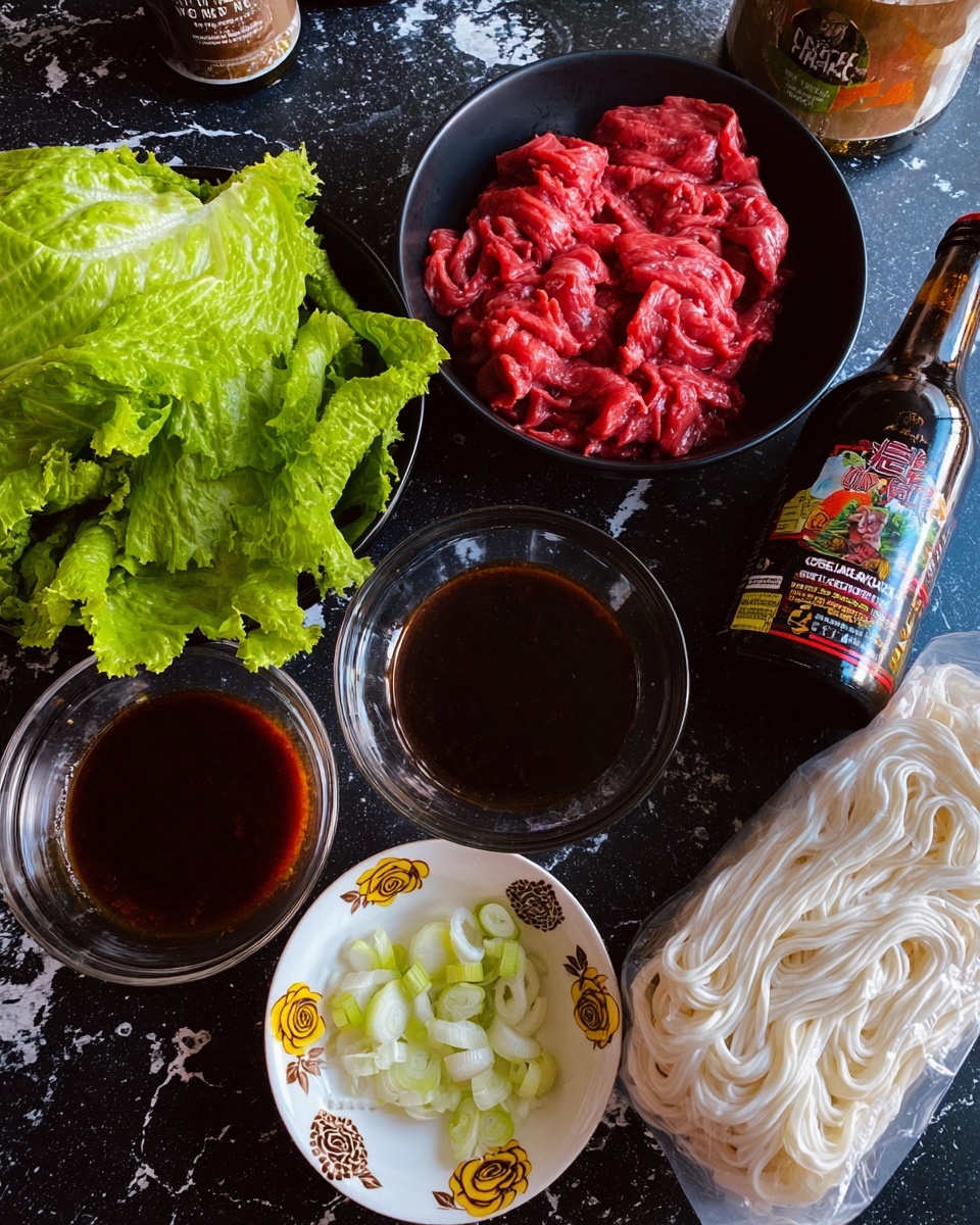 The image shows a collection of cooking ingredients arranged on a dark surface with a white marbled texture. There is a black bowl filled with bright red marinated sliced meat, a black bowl holding fresh bright green leafy lettuce, and a small white bowl decorated with yellow roses and brown designs containing chopped garlic and sliced white onions. Next to these is a clear glass bowl with dark reddish-brown sauce, a bottle of dark soy sauce, and a sealed package of white fresh udon noodles with a colorful image on the front. The ingredients are neatly placed and ready to be cooked photo taken with an iphone --ar 4:5 --v 7