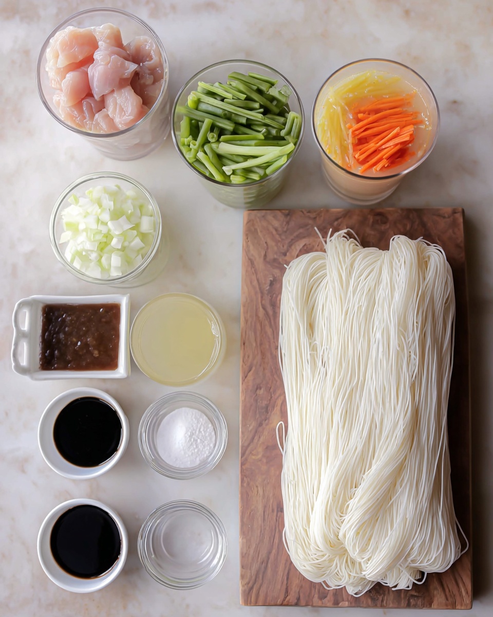 The image shows ingredients for a dish placed neatly on a wooden surface that will be changed to white marble. On the right side, there is a large bundle of thin white noodles with a soft texture. To the top right, there is a glass with a pale yellow liquid. Next to it on the left is a small clear bowl of chopped white onions. Above the noodles, there is a tall glass filled with chopped vegetables like green beans, light green spring onions, and orange carrots. Above this glass, there is another tall glass filled with raw pink chicken pieces. Below the vegetables, there is a small white sauce dish containing a thick dark brown sauce. To the left of this, there is a small container of white granulated salt. Below these items, two small white bowls with dark soy sauce are placed side by side. Below them, two small clear containers hold minced garlic and a clear liquid respectively. The setup is organized with clean lines and natural colors, all placed on a white marbled surface photo taken with an iphone --ar 4:5 --v 7