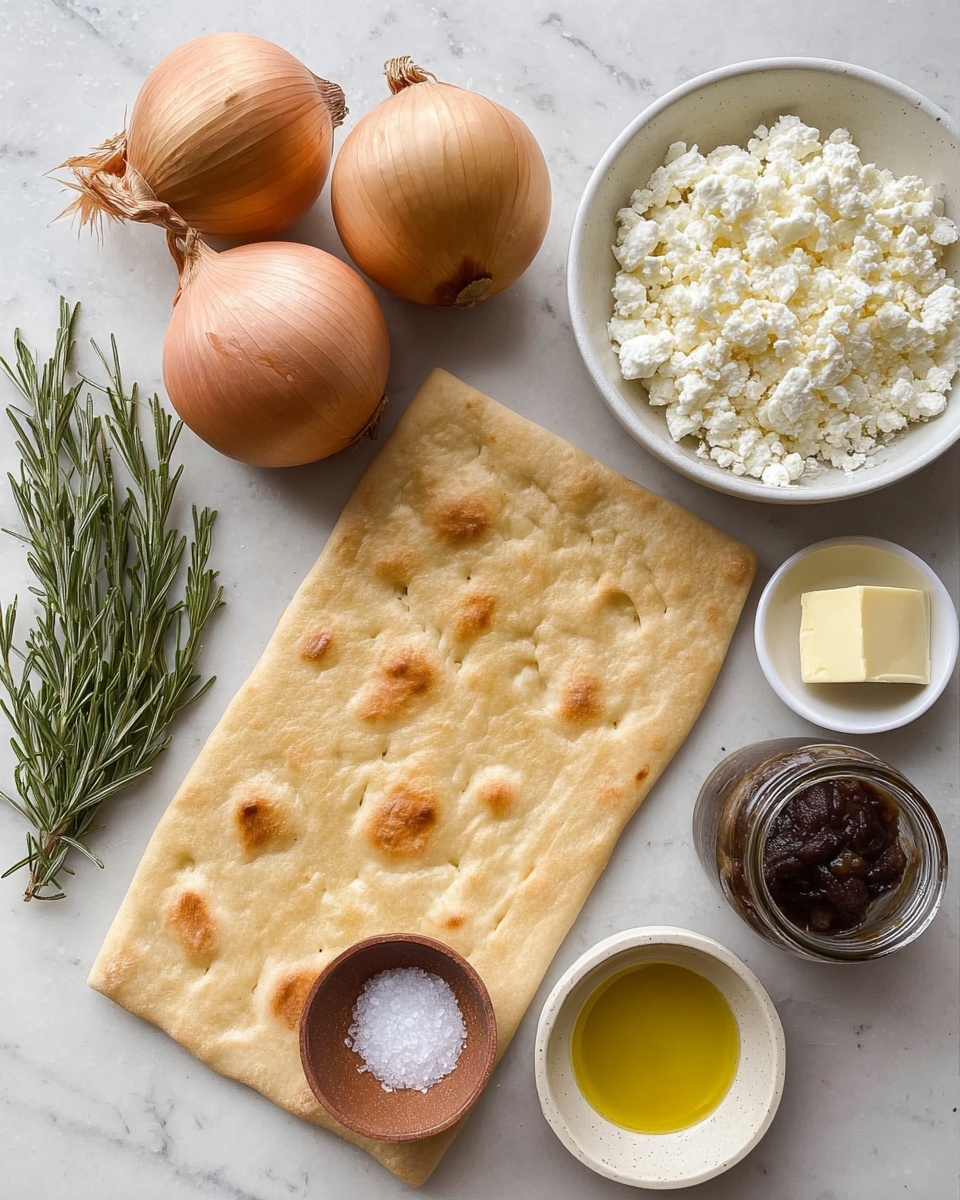 The image shows a rectangular piece of flatbread with a pale golden brown color and a soft, slightly bumpy texture spread out on a white marbled surface. Around the flatbread, three whole yellow onions with brown dry skins and root ends face up, placed near a sprig of fresh green rosemary. To the right, there is a white bowl filled with crumbled white cheese. Small white bowls hold a light yellow square of butter and golden olive oil. Nearby, a small earthenware bowl contains white coarse salt, and there is an open jar with a dark brown paste-like sauce inside. photo taken with an iphone --ar 4:5 --v 7
