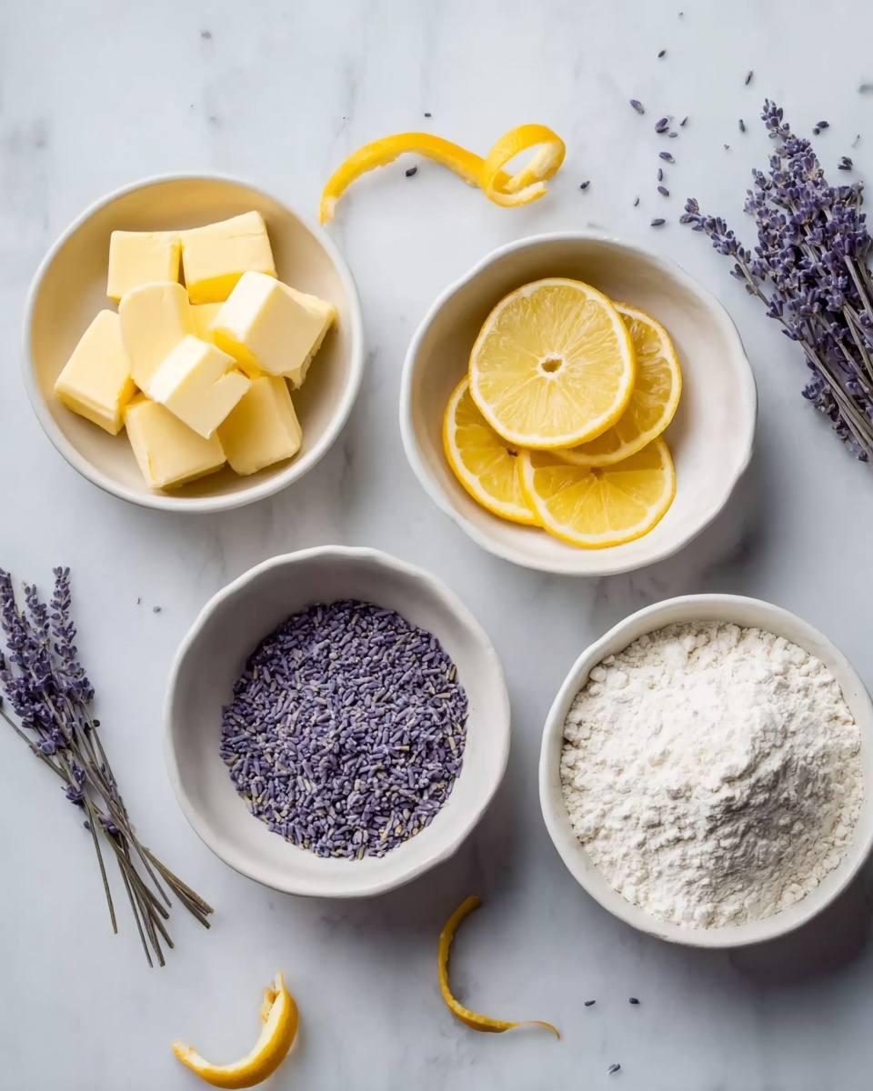 The image shows five white bowls on a white marbled surface. The top left bowl has four yellow cubes of butter. The top middle bowl holds four lemon slices with bright yellow skin and pale yellow flesh. The top right bowl contains small, purple dried lavender flowers. The bottom left bowl also has purple dried lavender flowers. The bottom right bowl is filled with white flour, slightly mounded in the middle. Around the bowls are a few small sprigs of lavender and two thin, curly strips of yellow lemon peel. Photo taken with an iphone --ar 4:5 --v 7