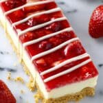 Philadelphia Cheesecake Bars with Strawberry Sauce and White Chocolate Drizzle Recipe