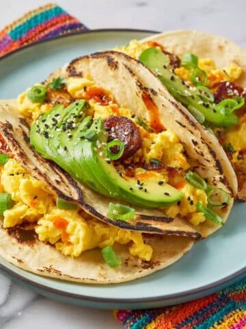 Breakfast Smashed Tacos with Sausage, Eggs, and Avocado Recipe