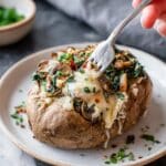 Cheesy Vegetarian Loaded Baked Potatoes with Spinach and Mushrooms Recipe