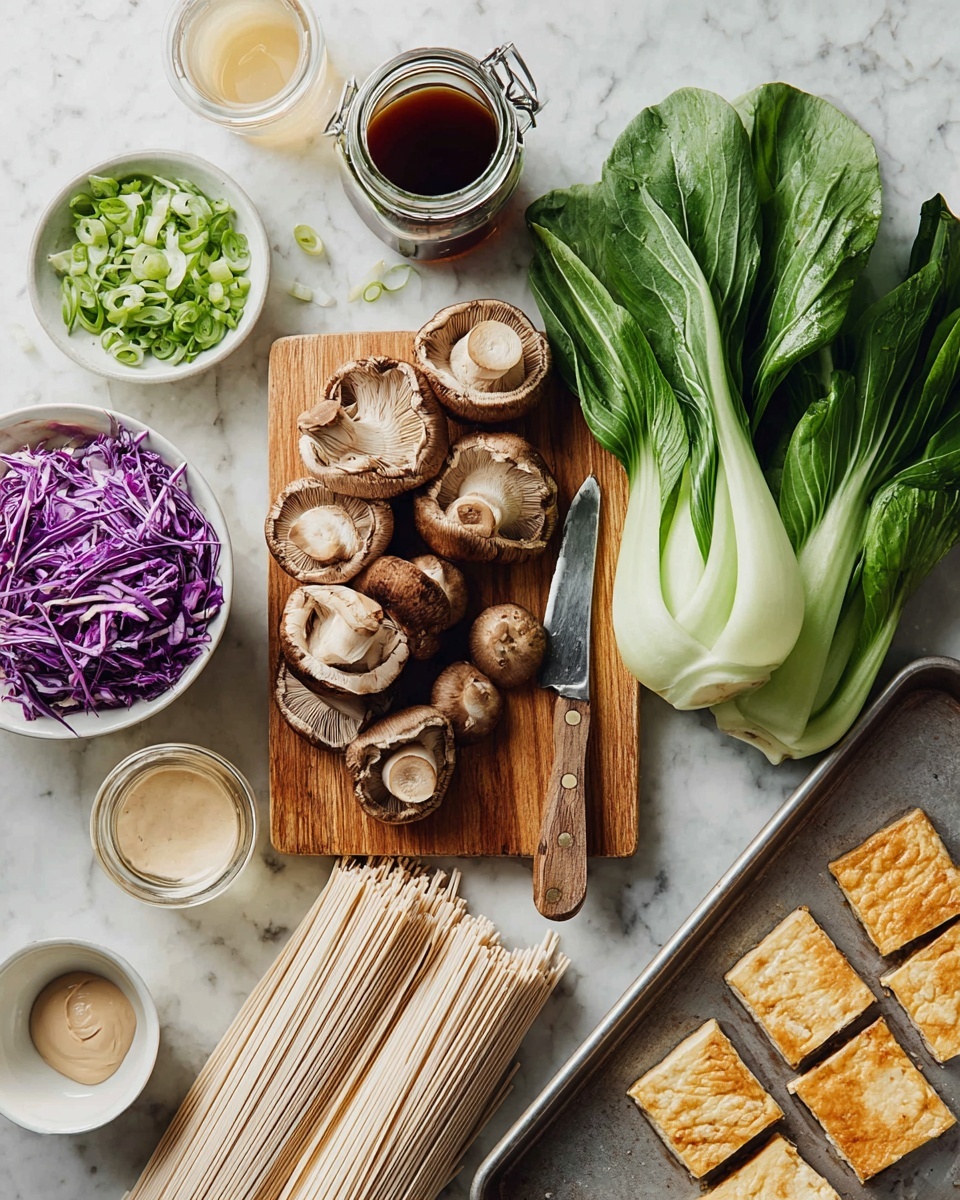 The image shows fresh cooking ingredients arranged neatly on a white marbled surface. There is a wooden cutting board in the middle holding several whole and sliced brown mushrooms next to a small knife. To the left, a white bowl contains bright purple shredded vegetable strips and chopped green onions. On the right side of the board, there are large vibrant green bok choy leaves stacked in a small pile. Nearby, a glass jar holds dark brown liquid broth, and next to it is a small glass with light-colored liquid. Below, two bundles of uncooked light beige noodles lie side by side. A metal baking tray at the bottom right corner holds evenly spaced rectangular pieces of cooked tofu, golden brown on top. Small white bowls, one with light paste and another with a pale liquid, are placed around the cutting board. The scene is clean and fresh, focused on natural colors and simple textures, photo taken with an iphone --ar 4:5 --v 7
