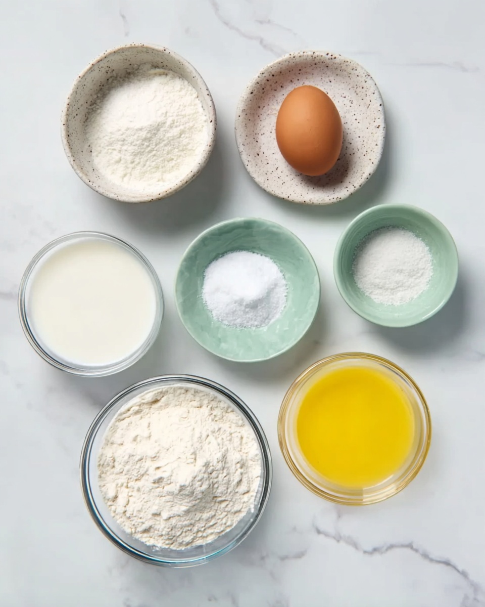 The image shows seven small bowls and dishes with different baking ingredients arranged neatly on a white marbled surface. There are two medium clear glass bowls at the bottom, one filled with white milk and the other with white flour. Above them, from left to right, there is a tiny white speckled bowl with salt, a slightly larger speckled dish holding one brown egg, a small white speckled bowl with granulated sugar, a small light green bowl filled with white powder, and finally a small clear glass bowl with bright yellow melted butter. The arrangement is clean and organized. Photo taken with an iphone --ar 4:5 --v 7