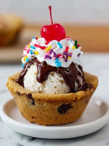 Cookie Cups from Refrigerated Cookie Dough Filled with Ice Cream and Chocolate Sauce Recipe