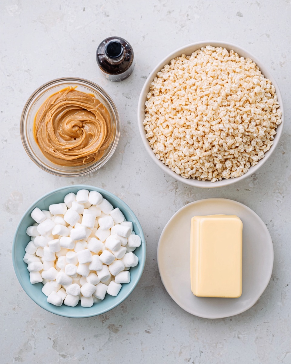 The image shows five containers on a white marbled surface, each holding a different ingredient. On the top left, there is a small bottle with a black cap containing a dark liquid. Next to it, a clear glass bowl is filled with smooth, light brown peanut butter with swirled texture on top. Below, a light blue bowl contains many small, white marshmallows tightly packed together. To the right, a similarly colored bowl holds a large amount of pale yellow puffed rice cereal with a rough, crunchy texture. Finally, in the center bottom, a white plate holds a solid, rectangular stick of pale yellow butter with smooth edges. Photo taken with an iphone --ar 4:5 --v 7