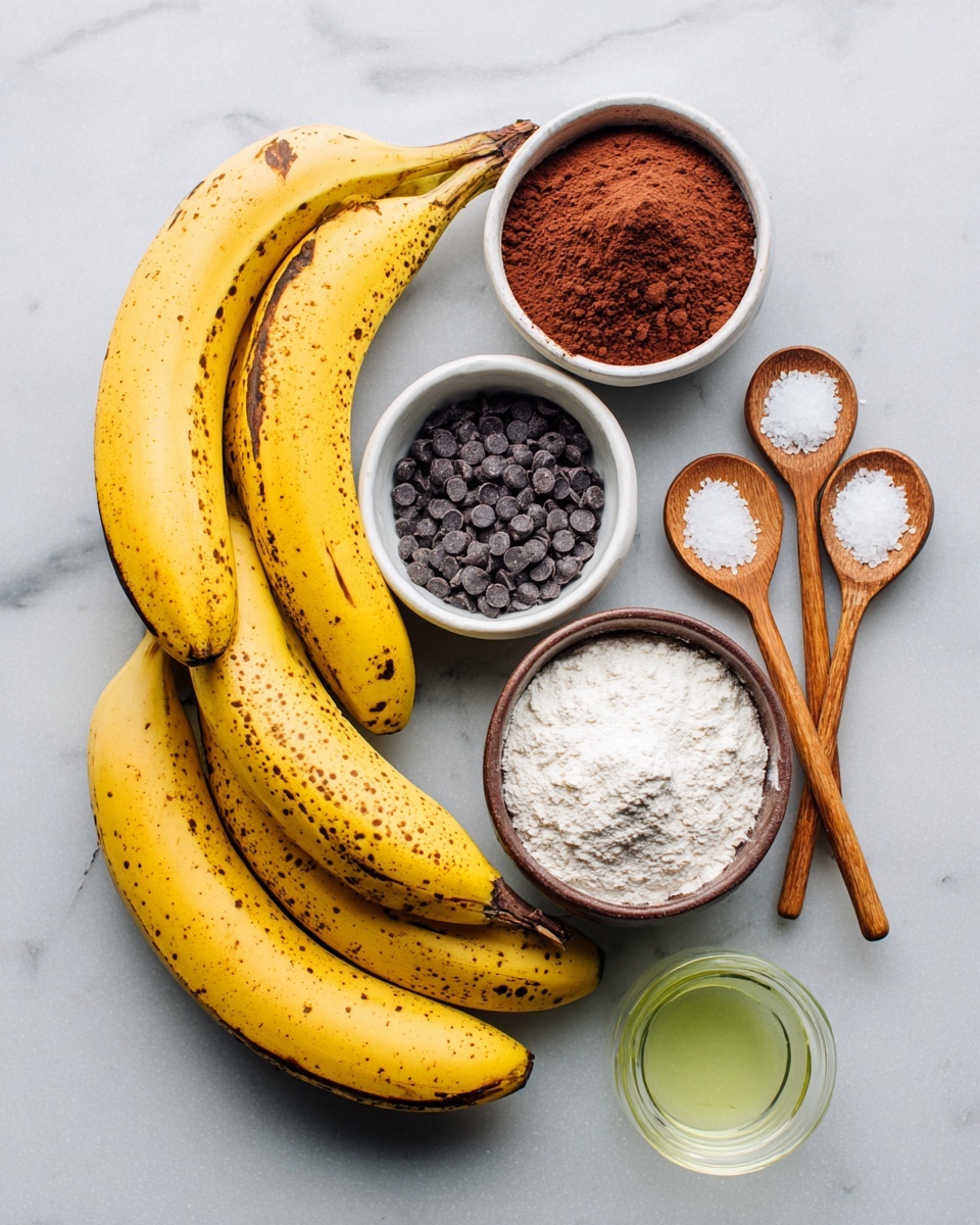 A bunch of ripe yellow bananas with brown spots lies diagonally on a white marbled surface on the left side; next to them are small white bowls filled with different ingredients: one bowl has dark brown cocoa powder, another bowl contains black chocolate chips, a third bowl is filled with white flour, and the last brown bowl holds white sugar. Two wooden spoons contain small amounts of white baking powder or salt, placed between the bananas and the bowls. At the bottom right, there is a small clear glass bowl with light green oil. The whole setting is neat and bright with a soft natural light. Photo taken with an iphone --ar 4:5 --v 7