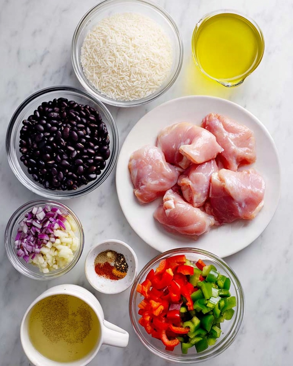 The image shows six bowls and one white plate arranged on a white marbled surface. The white plate in the center holds seven pieces of raw light pink chicken thighs. At the top left, a small clear bowl contains a mix of red and brown spices. Next to it, a small clear bowl with golden yellow oil. To the right, a white cup filled with light yellow broth with small bubbles on the surface. Below the broth cup, a clear bowl filled with black beans. At the bottom left, there is a clear bowl of white rice. Finally, at the bottom right, a clear bowl holds a colorful mix of chopped red and green bell peppers, purple onions, and green chopped jalapeños. The photo taken with an iphone --ar 4:5 --v 7