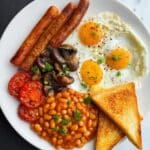 Full English Breakfast Recipe: Toast, Sausages, Eggs, Baked Beans, and Vegetables Recipe