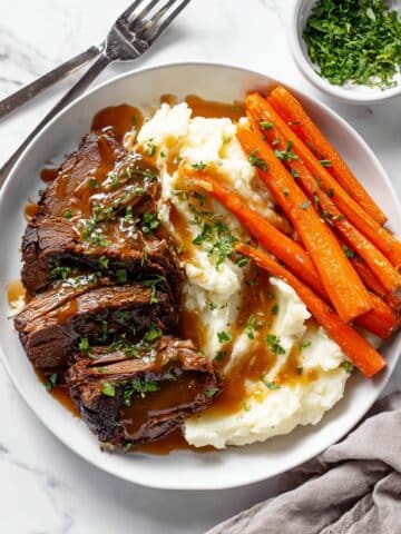Crock Pot Pot Roast with Carrots, Potatoes, and Herb Gravy Recipe
