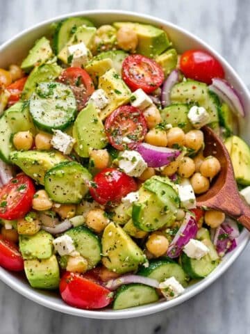 Fresh Chickpea Salad with Cherry Tomatoes, Cucumber, Avocado, and Feta Recipe