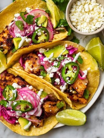Fish Tacos with Lime Crema and Cabbage Slaw Recipe