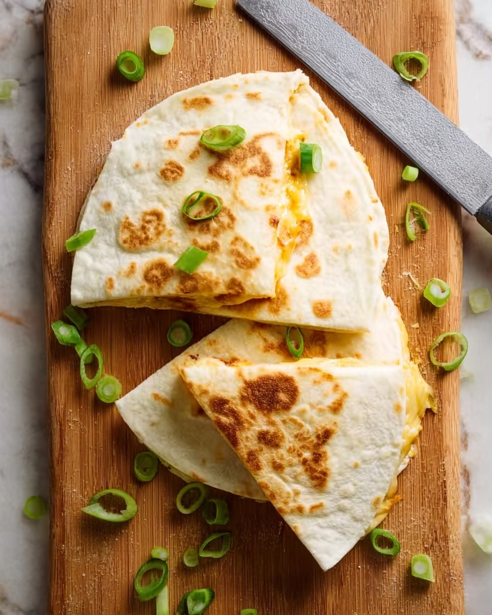 The image shows two toasted folded tortillas with golden-brown spots on the white flour wraps. One tortilla is placed fully flat while the other is partially opened to show a glimpse of melted light yellow cheese inside. The tortillas rest on a wooden board with scattered green sliced spring onions around. A serrated knife is positioned at the top edge of the board. The background is a white marbled texture. photo taken with an iphone --ar 4:5 --v 7